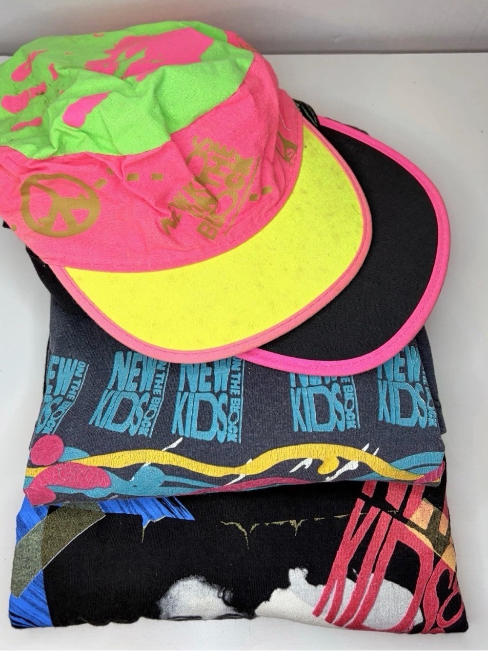 New Kids On The Block 80’s Memorabilia includes shirts and caps